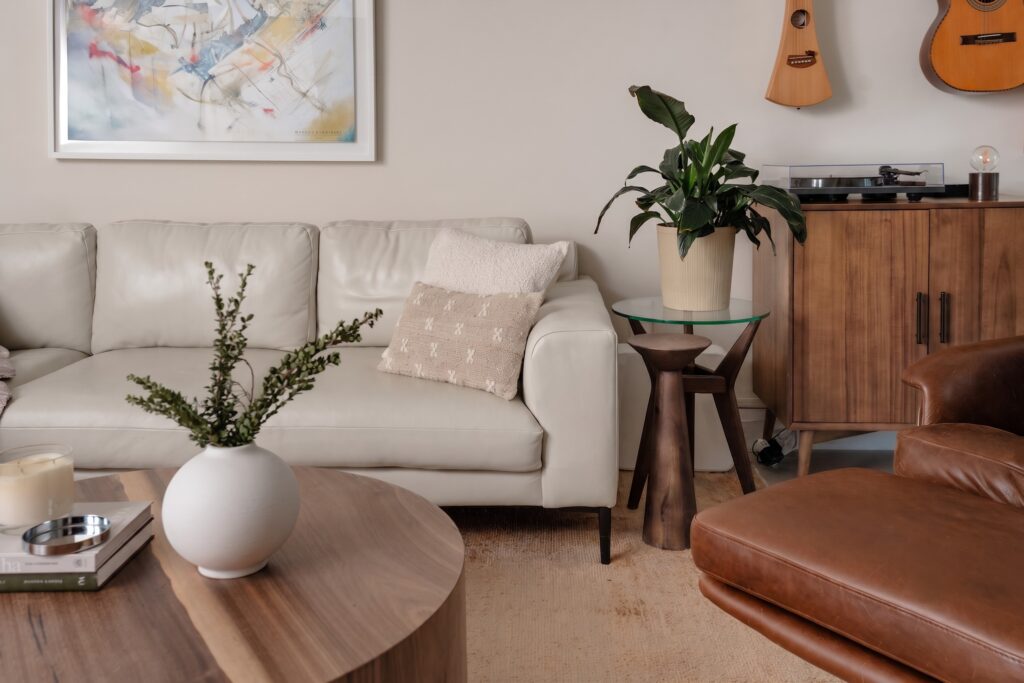 2_Living_Room_Shot_2_F Miami Shores Residence living room with walnut coffee table and layered neutral textures — Duoma Atelier